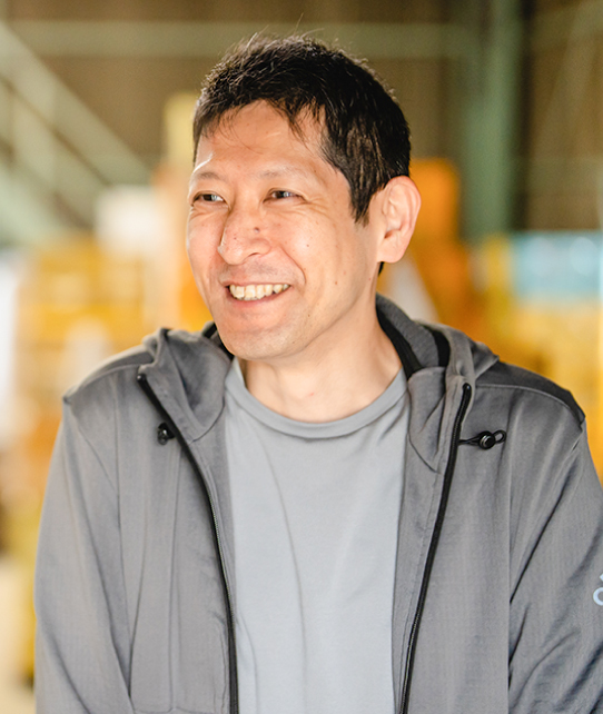 取締役 生産管理担当　萬 智昭